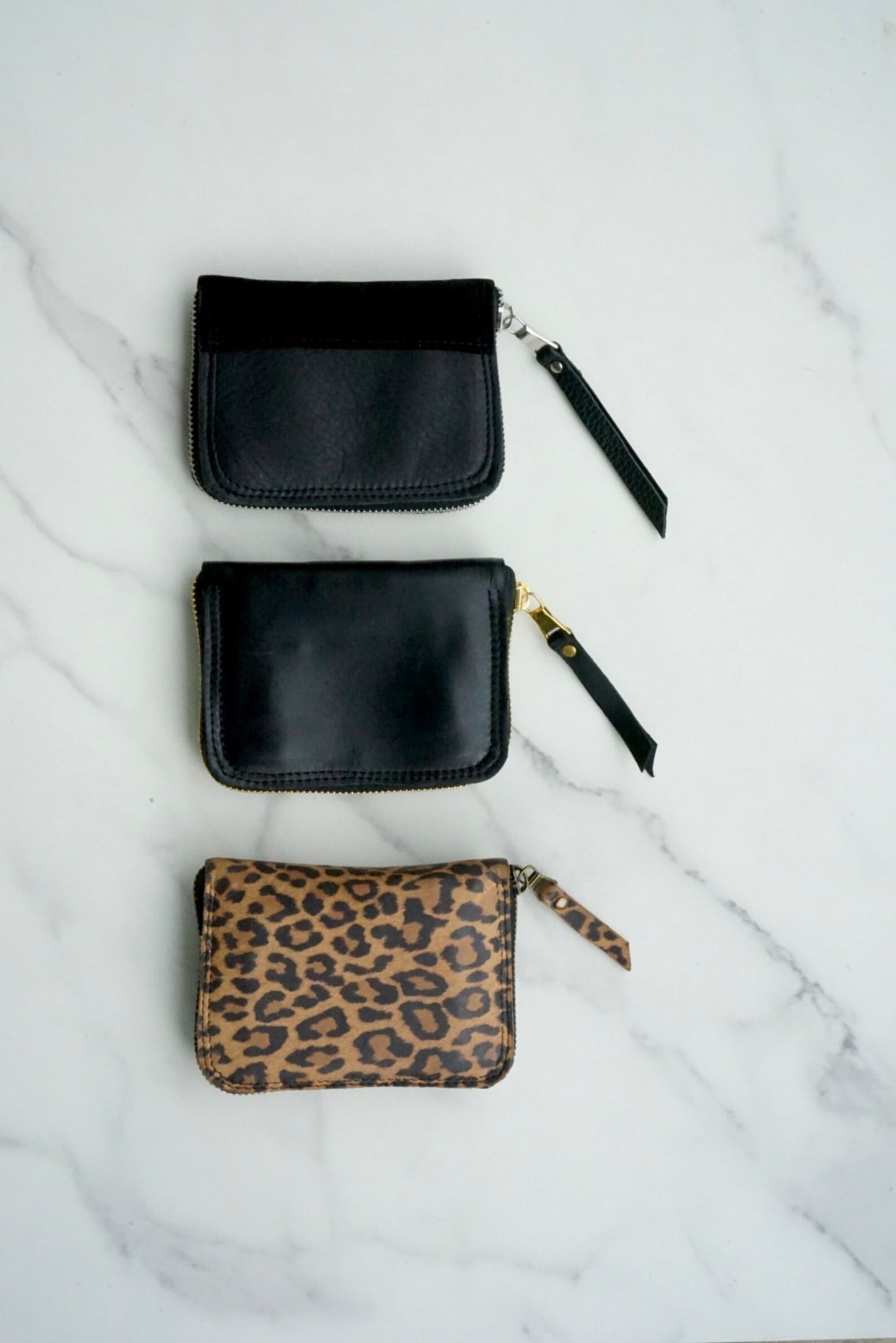 The TOOSH Zipper Wallets